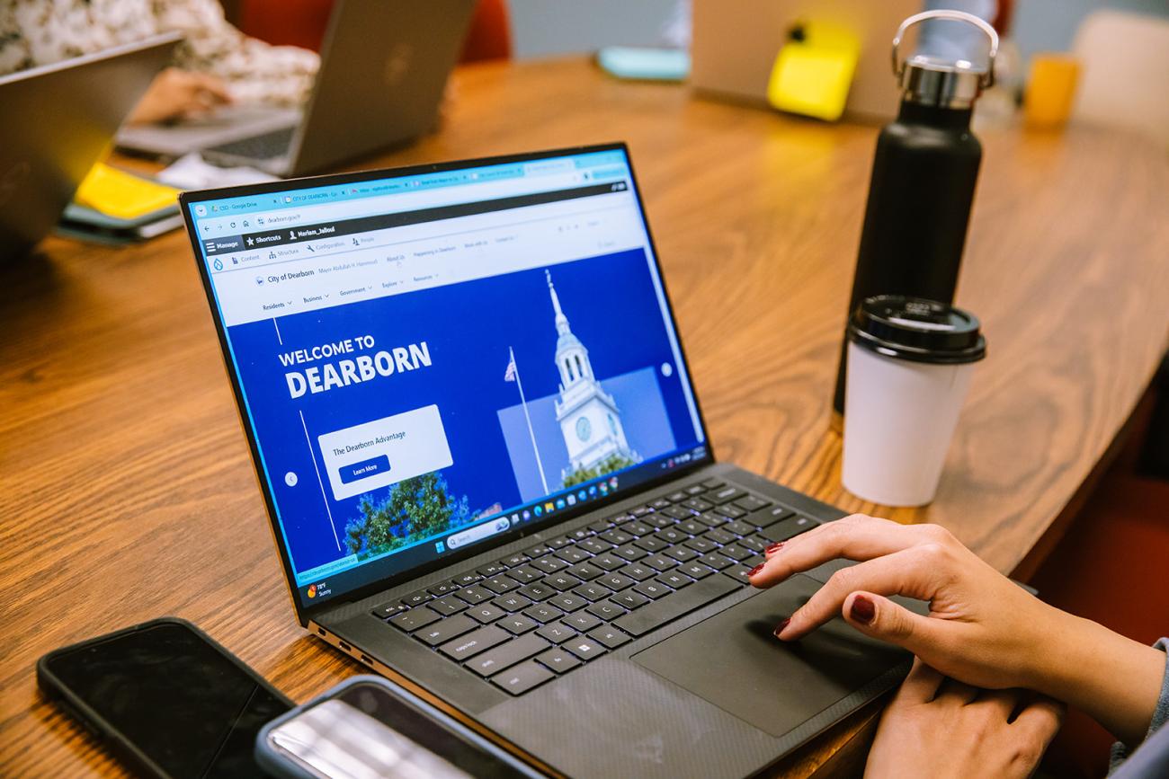 website search - computer and hand